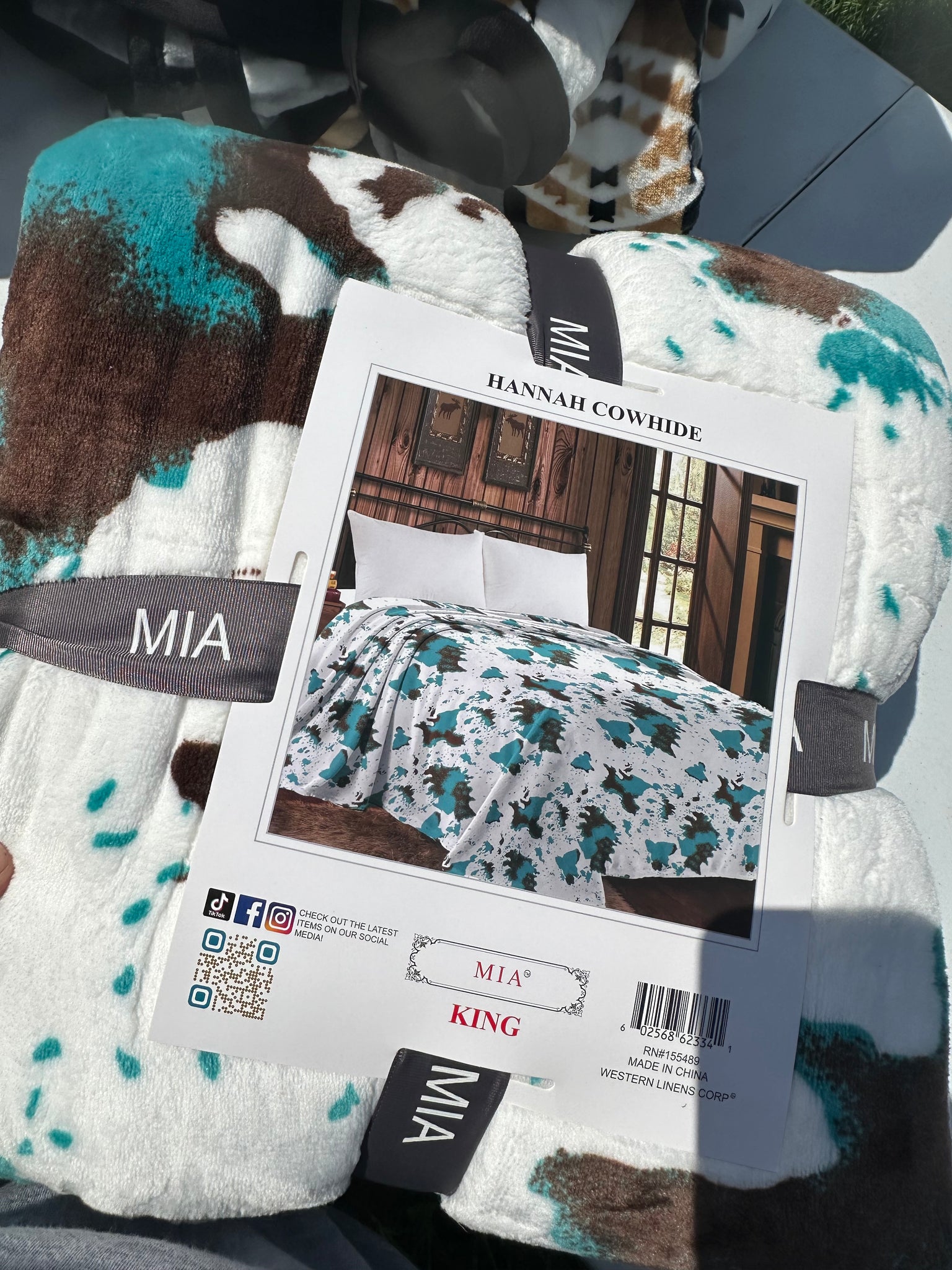 King teal cowprint blanket